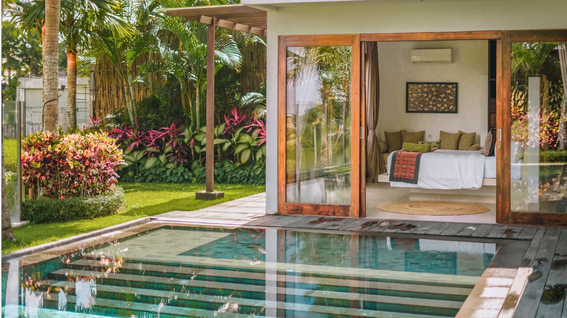 2 Bedroom Luxury Pool Villa with a private pool and lush tropical garden